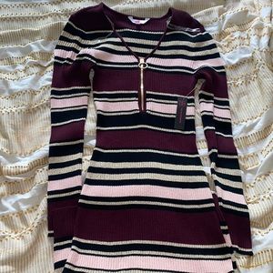 Woman striped bodycon dress. Zips up